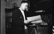 Dorothea Lange's photograph (for the War Relocation Authority) of Dave Tatsuno rereading his University of California notes before evacuation in 1936.